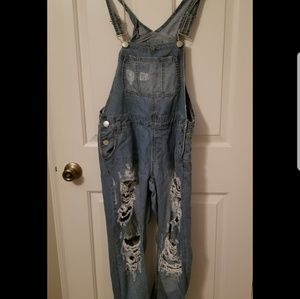 Overall ripped jeans